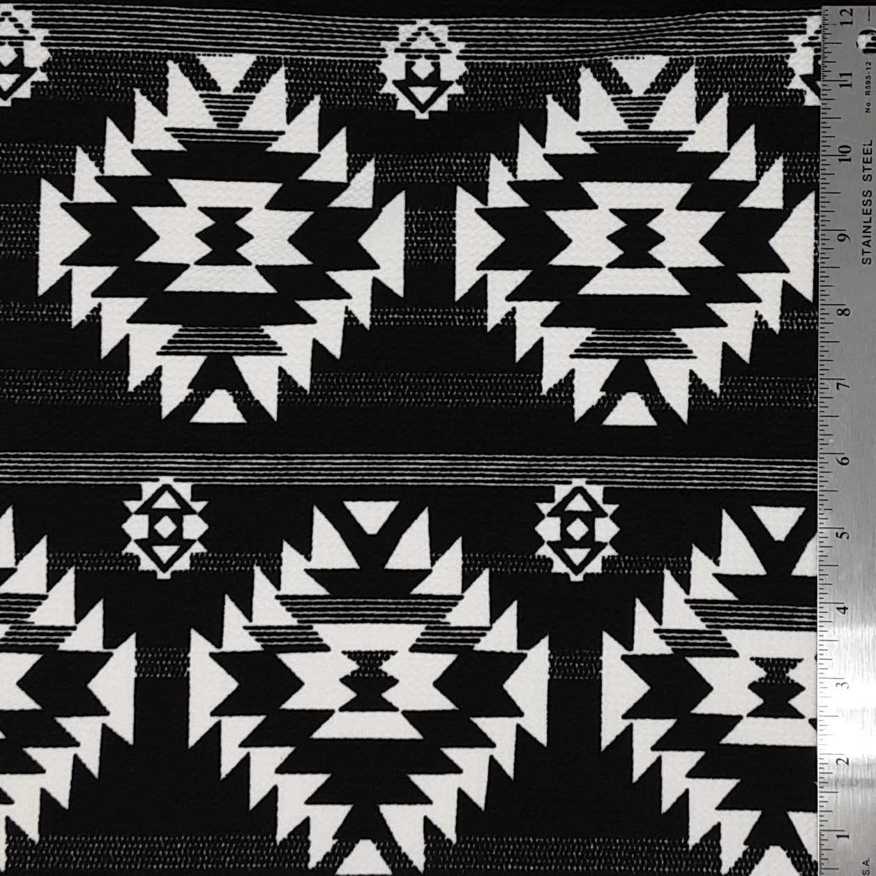 BLACK/IVORY AZTEC PRINT BUBBLE BULLET PRINT